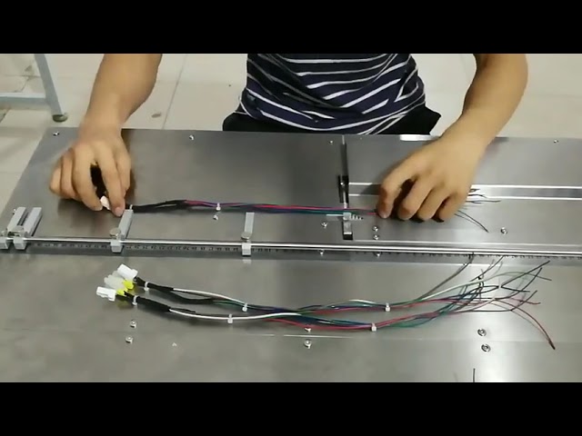 เครื่องรัดสายไฟมือหมุนและเครื่องมัดสายไฟอัตโนมัติ | อุปกรณ์รัดและมัดสายไฟในโรงงาน