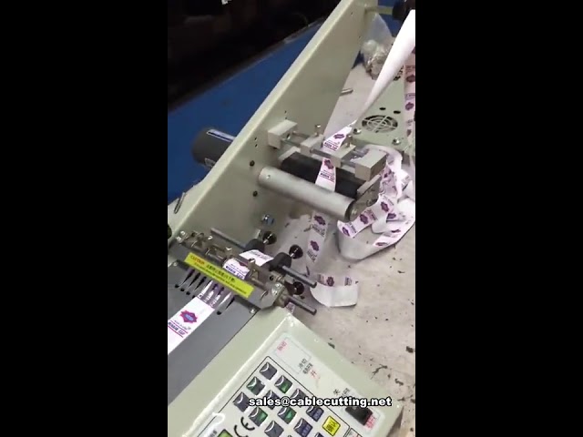 เครื่องตัดริบบิ้นและฉลากอัตโนมัติ | เครื่องตัดเทปความเร็วสูงสำหรับโรงงาน