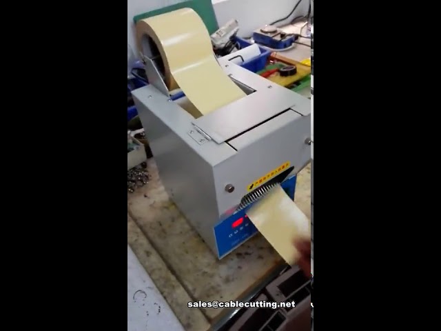 เครื่องจ่ายเทปไฟฟ้าสำหรับเทปกาวสีเหลืองกว้าง 100 มม. | เครื่องพันเทปอุตสาหกรรม